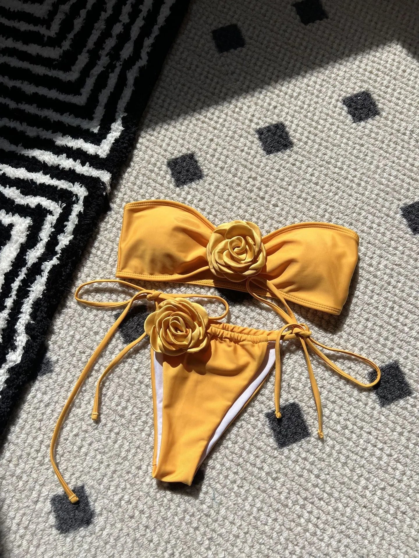 Solid colour rose tube top one-piece swimsuit for women with an adjustable drawstring strap and split style briefs.