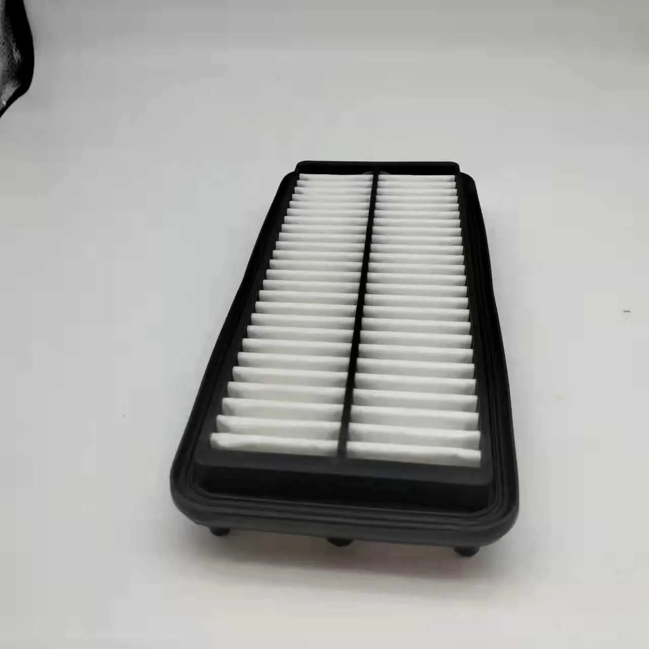 Black car air filter showing 256mm diameter measurement for modern vehicle replacement