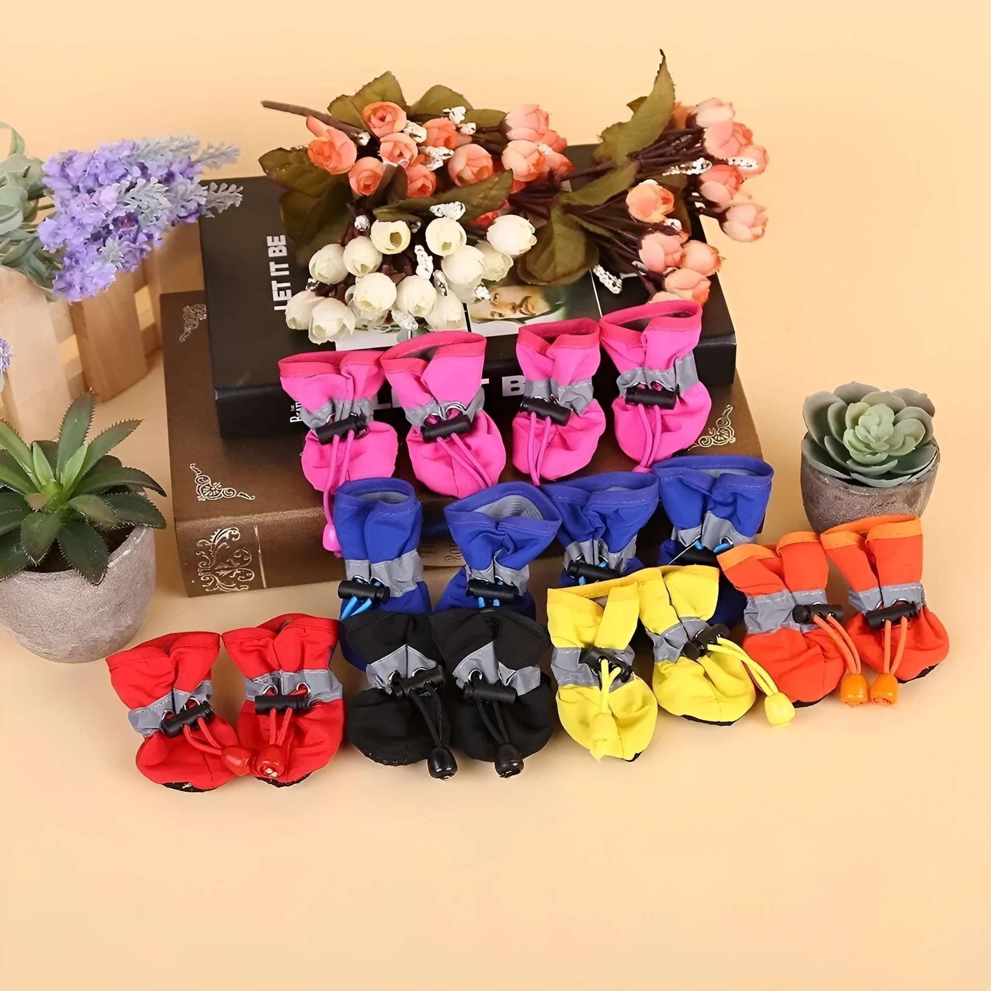 Set of four dog shoes in cloth material with soft soles, shown in multiple colour options including fleece-lined variants