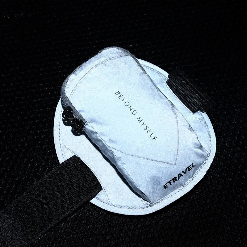 Reflective running arm bag with adjustable strap showing capacity for 7-inch phones