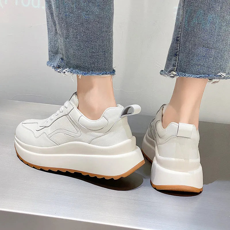 Women's beige-lined white casual sports shoes made from cattlehide leather with an English muffin heel.