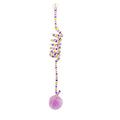 Hanging cat toy with bell stick and red inflatable ball attached to a glass door by a suction cup.