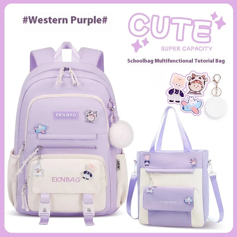 Pink waterproof Oxford cloth school backpack for girls with curved shoulder straps on a white background.