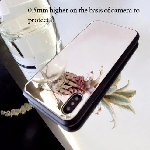 Black iPhone case with a built-in mirror on the back, compatible with iPhone X, 7, and 8 Plus models.