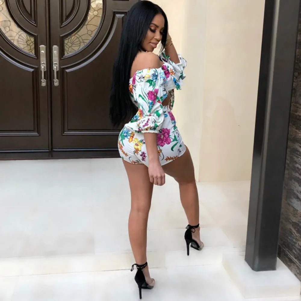 Women's digital print two-piece outfit with pile sleeves on short-sleeve top and matching shorts in multi-colour pattern