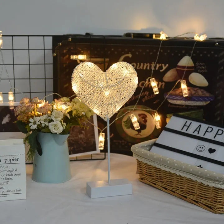 Rattan star-shaped LED lamp with copper wire frame measuring 23x40cm