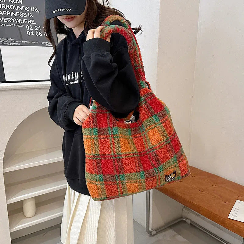 Women's soft plush plaid crossbody tote bag in army green, showing horizontal square shape and shoulder strap