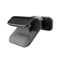 Black universal gravity car phone holder showing 360-degree rotation, mounted on a car air vent.