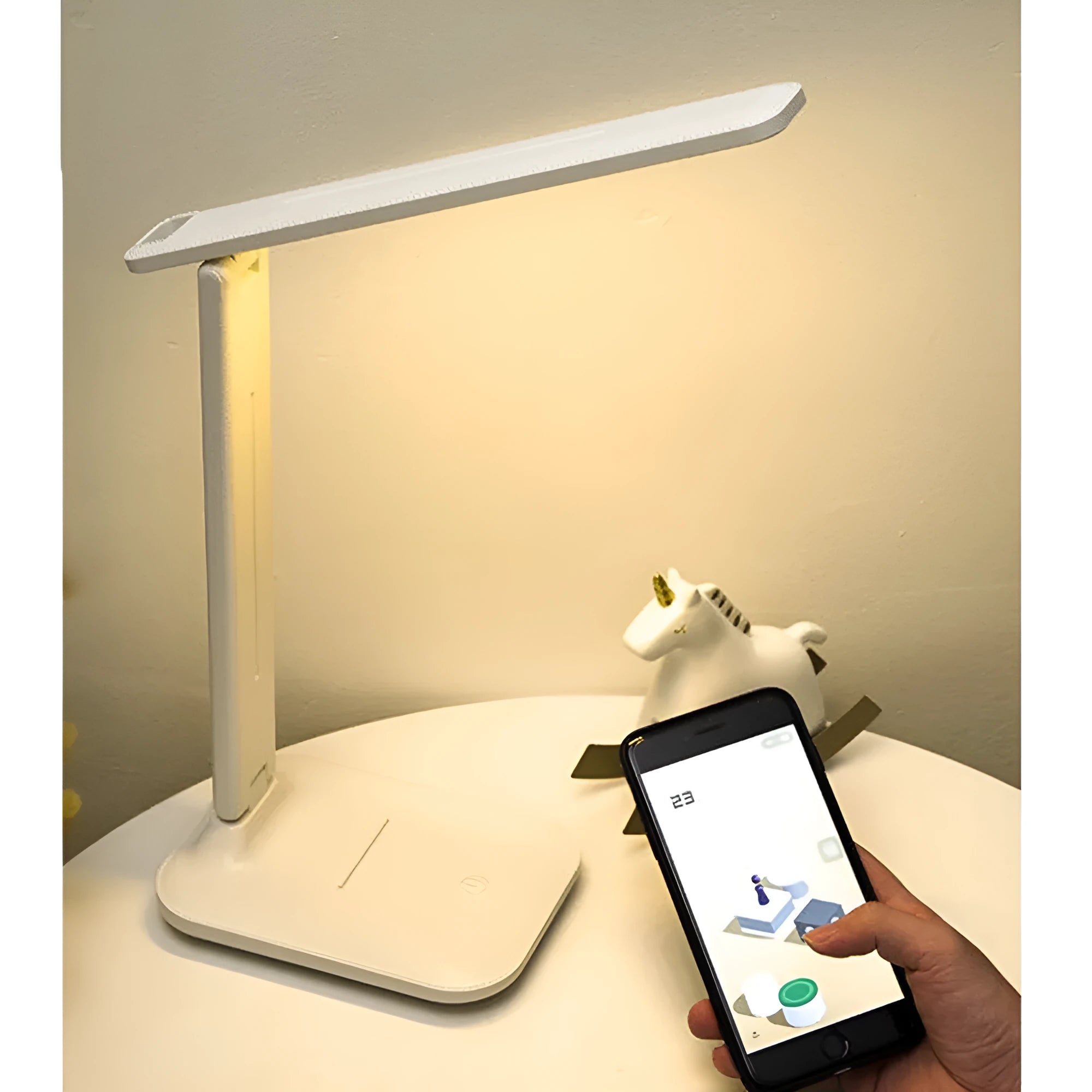 White bedside lamp with touch dimming control and USB charging port for children's bedrooms