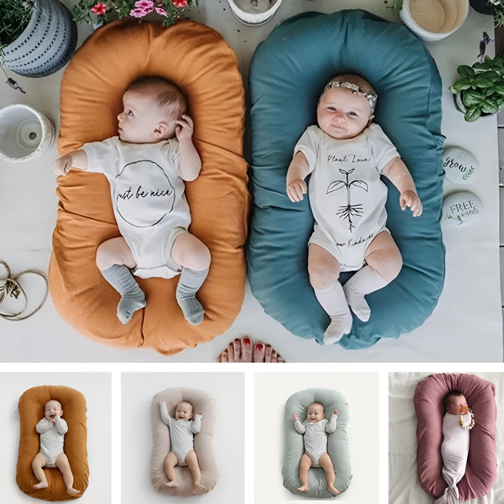 Beige portable cotton baby nest crib cushion measuring 75cm by 45cm for infant sleep.