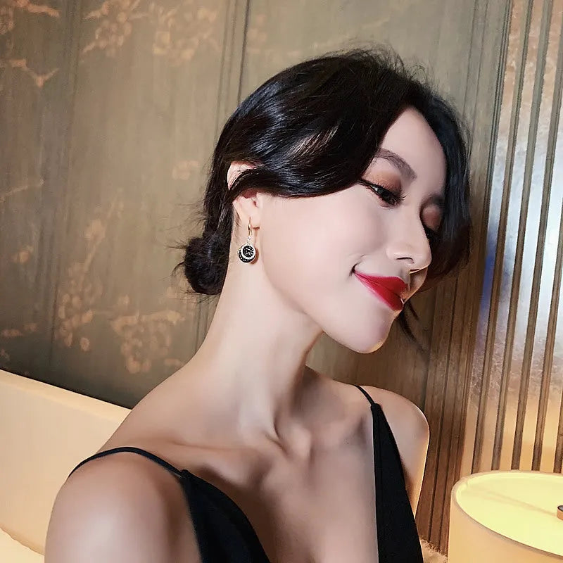 Black geometric retro Hong Kong style alloy earrings with round design measuring 3.6cm length