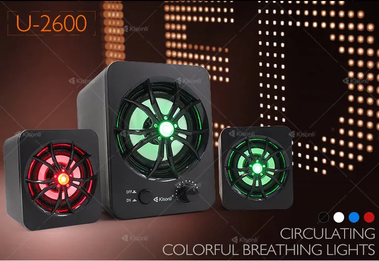 Green 2.1 USB computer speaker with colourful LED lighting on desktop