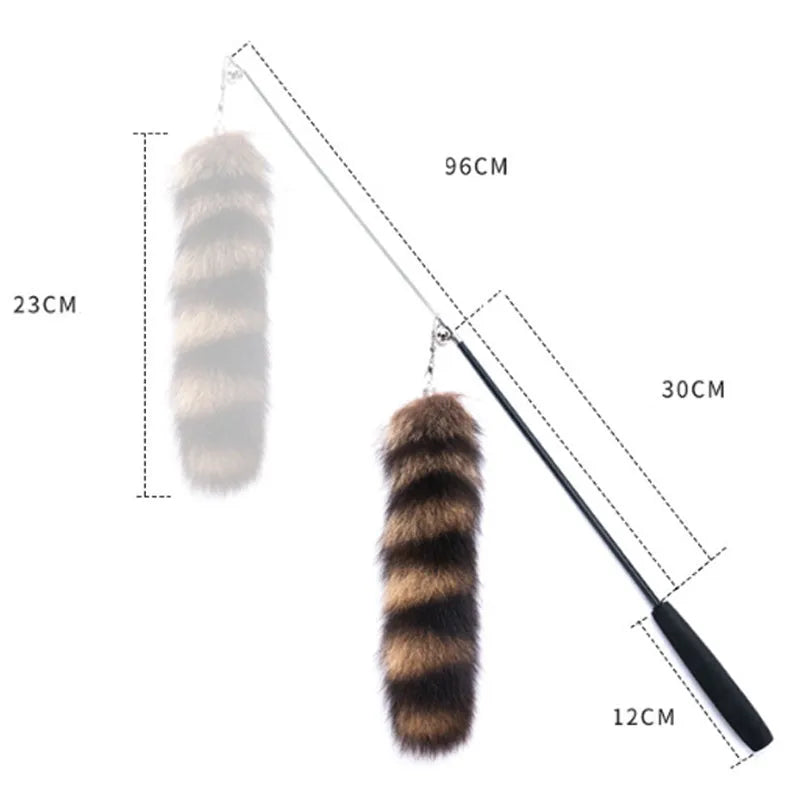 Black cat toy wand with feather teaser on elastic string measuring 42cm