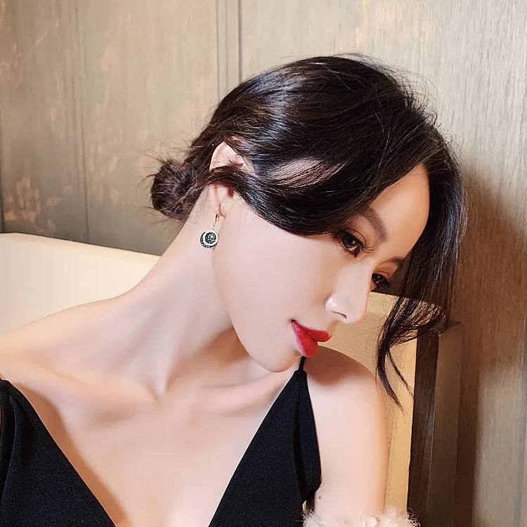 Black geometric retro Hong Kong style alloy earrings with round design measuring 3.6cm length