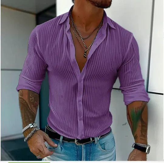 Man wearing a loose fit striped cardigan shirt in British style with a 3D pattern.