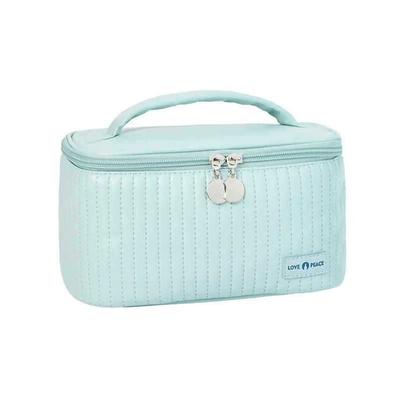 Open-top solid colour PU leather makeup bag in a choice of six colours.