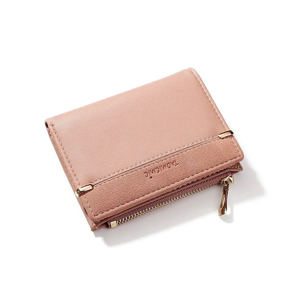 A closed ladies short zipper wallet in PU leather, showing its compact 2-fold design.
