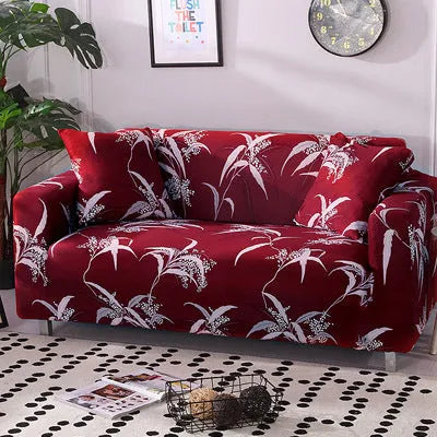 Geometric patterned stretch sofa slipcover fitted on a modern two-seater sofa.