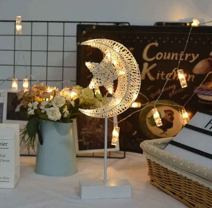 Rattan star-shaped LED lamp with copper wire frame measuring 23x40cm