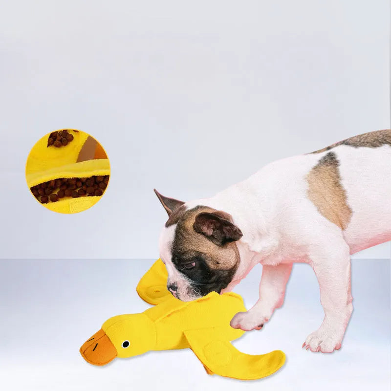 Yellow teddy bear dog toy with duck sound and treat compartments for training