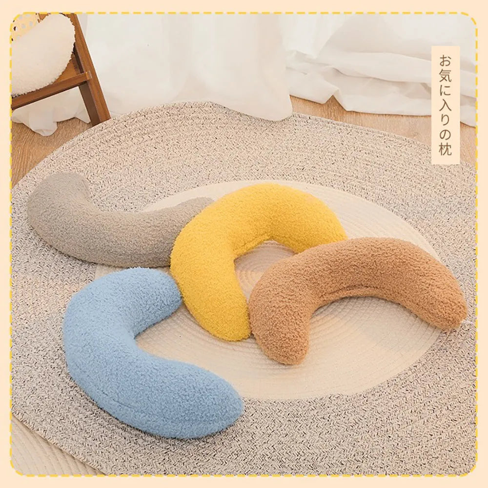 U-shaped blue cat pillow with adjustable collar for cervical support during feline sleep