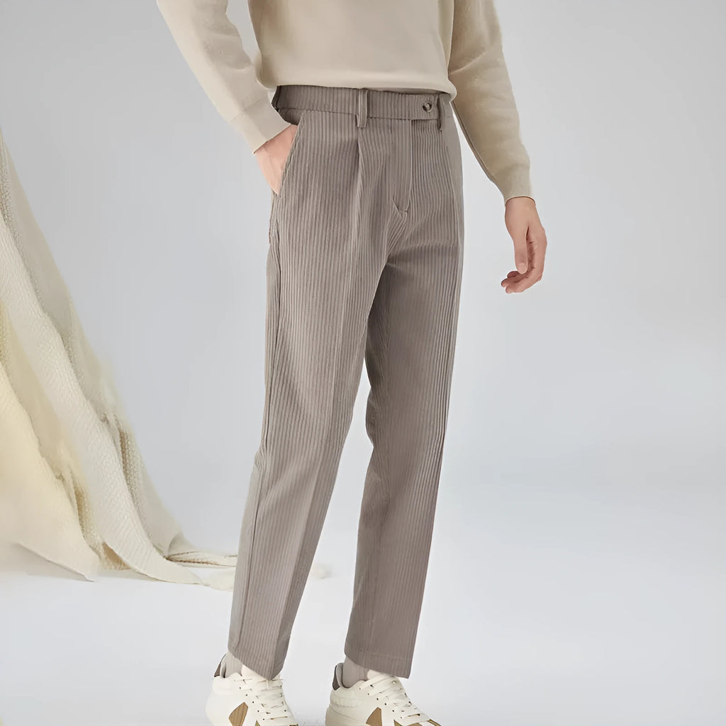 Men's straight-leg corduroy trousers in loose fit, shown in beige colour