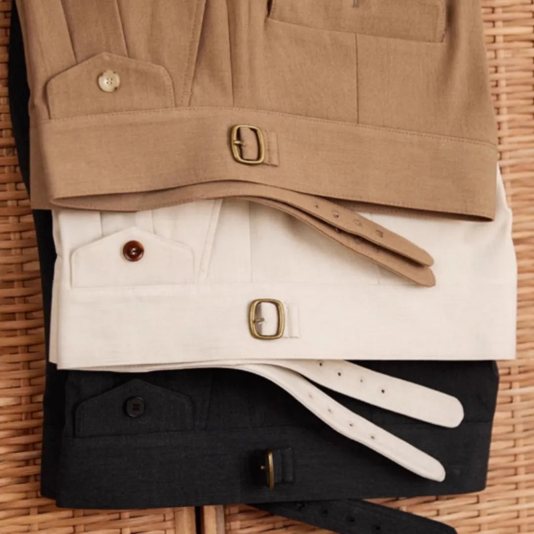 Men's slim fit straight leg trousers in dark grey, light brown, or light apricot, made from wrinkle-resistant polyester fabric.