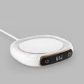 USB coffee mug warmer coaster in white on a desk, with a mug of coffee on top, 130x110x23mm, 10W constant temperature heating pad