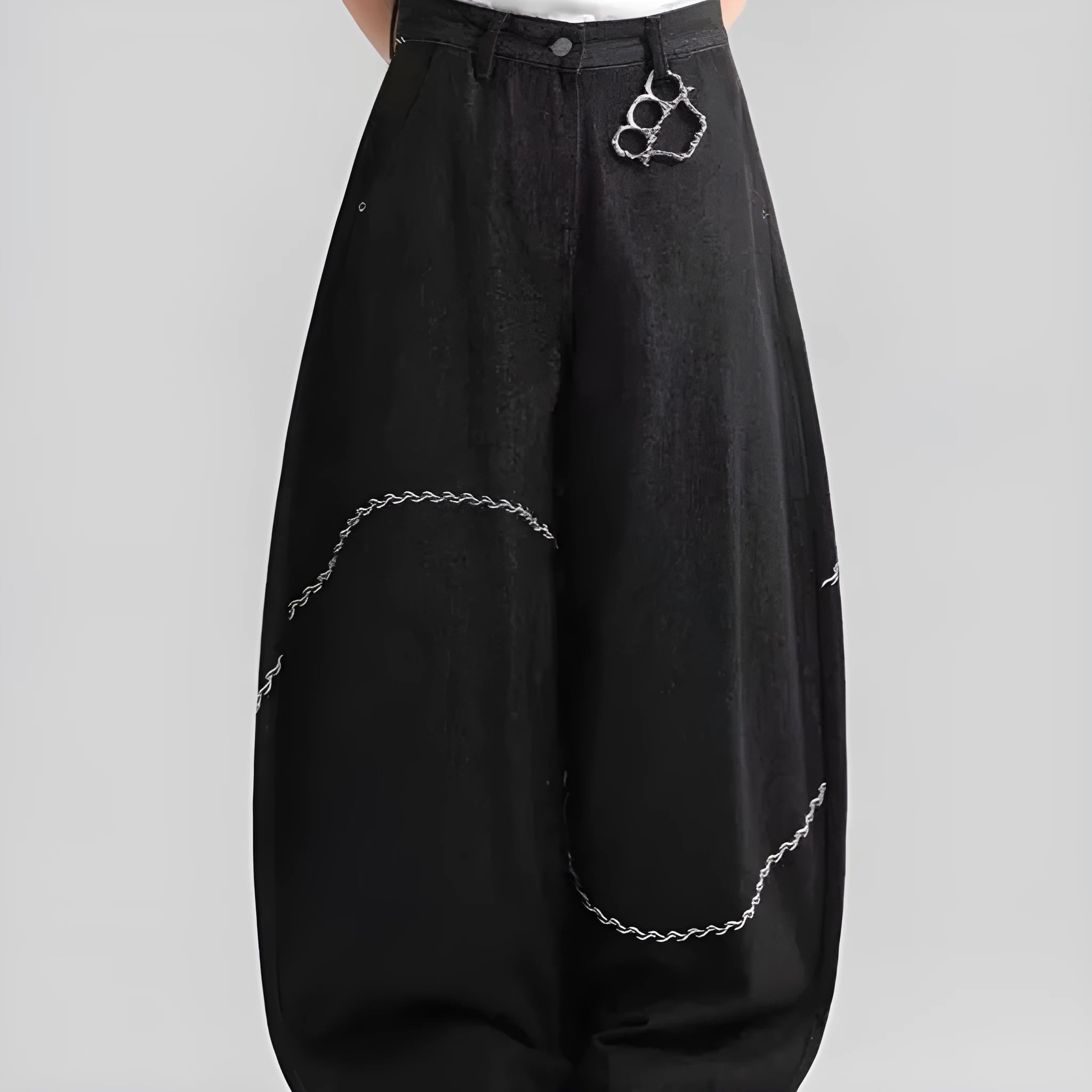 Black straight-leg polyester denim trousers on a hanger, showing mid-waist fit and zip fly.