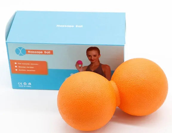 High density peanut massage ball in black on a white background, portable muscle relief tool