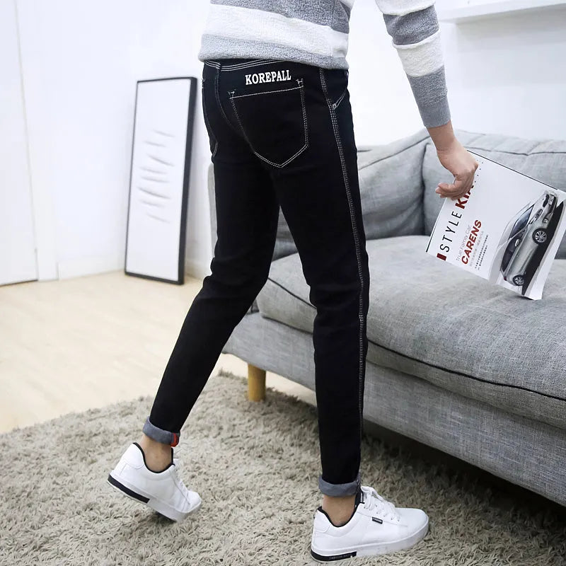 Men's autumn black ripped ankle jeans with micro elastic denim, youth-style tapered fit
