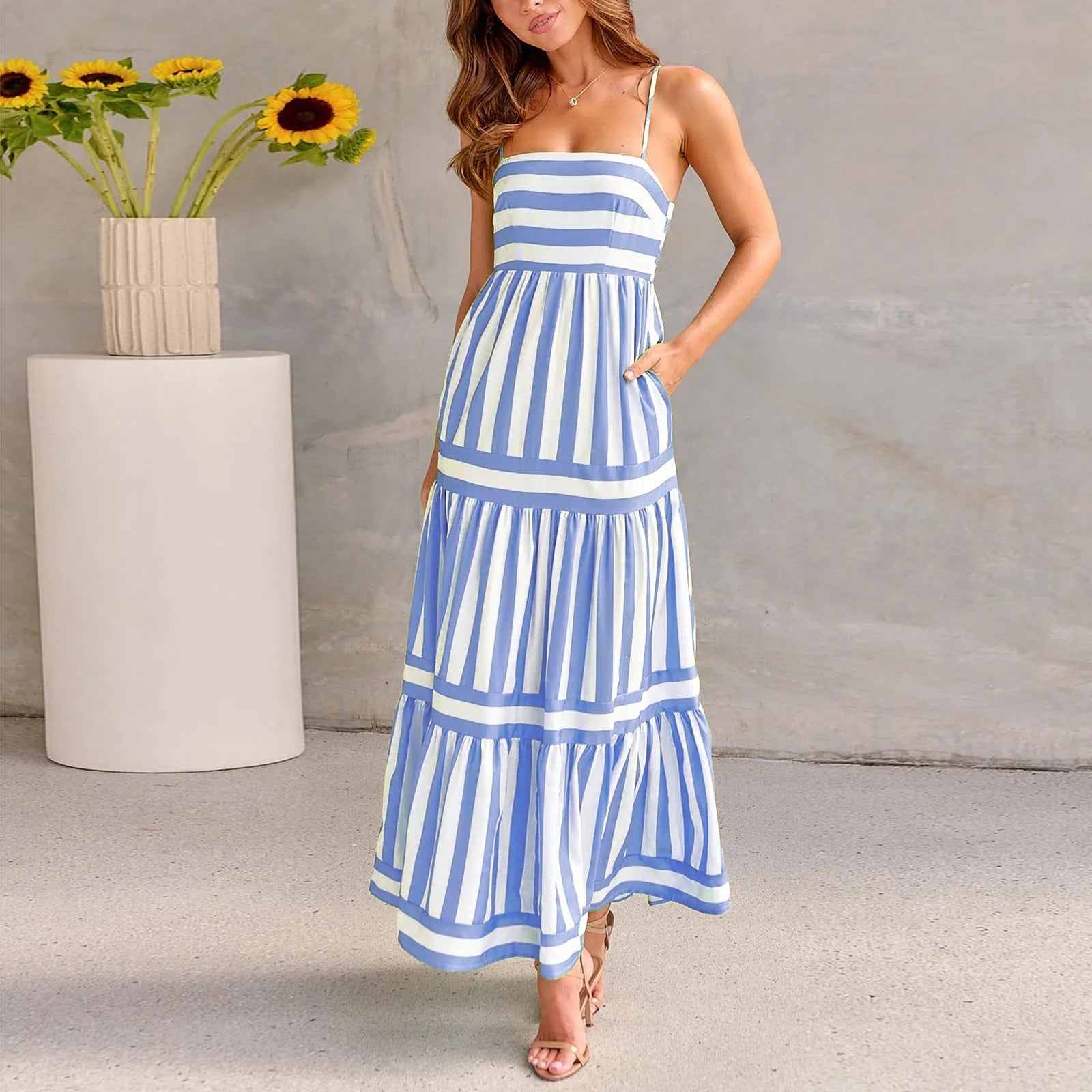 Women's striped printed summer dress with suspender straps and side pockets in blue colour