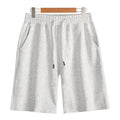 Men's cotton straight leg sports shorts in light grey with elastic waistband