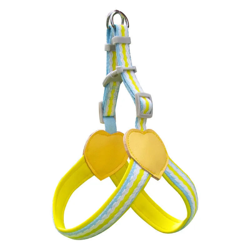 Nylon dog walking chest strap vest with an attached hand holding rope, shown in emerald green.