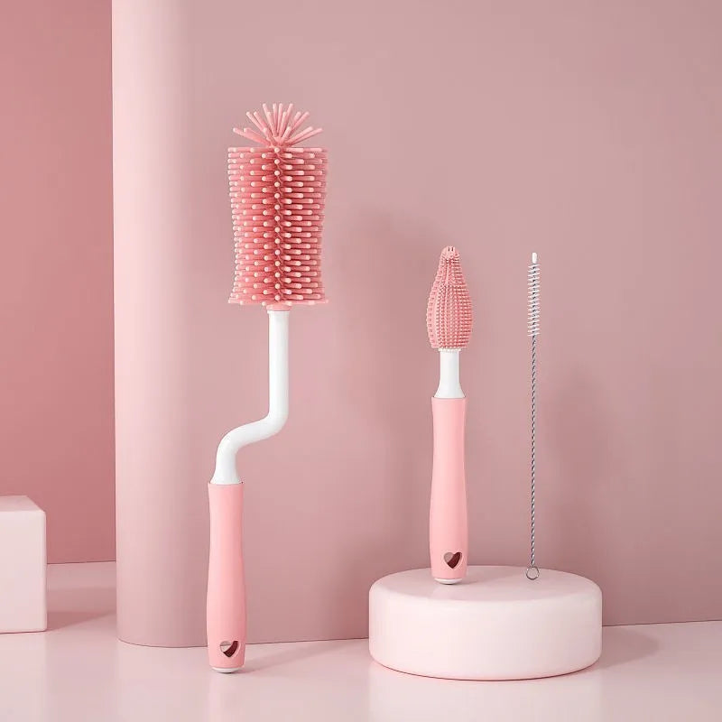 Silicone baby bottle brush and straw cleaner set in pink, blue, or yellow colours