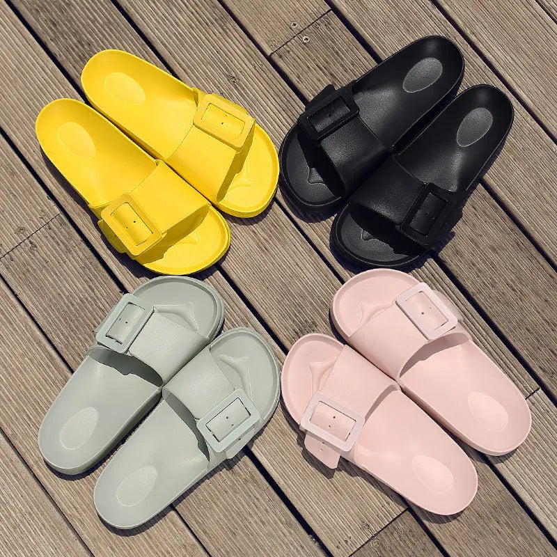 Women's grey blue flip-flop slippers with a buckle strap and soft EVA sole.