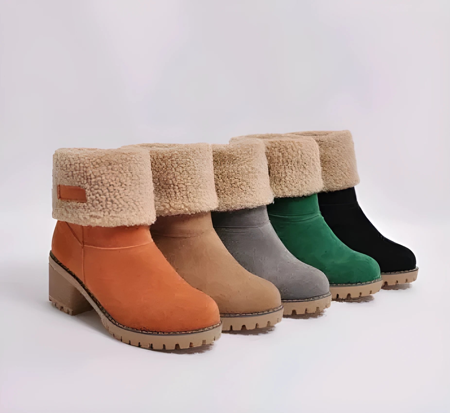 Women's mid-tube suede snow boot in black with a thick heel and round toe.