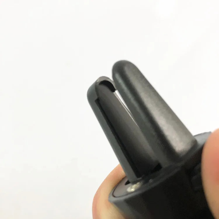 Glory black car phone holder with adjustable side grips mounted on a car air vent