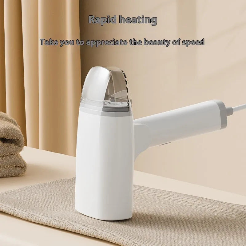 Blue and white handheld garment steamer unit showing compact design with water tank and steam nozzle