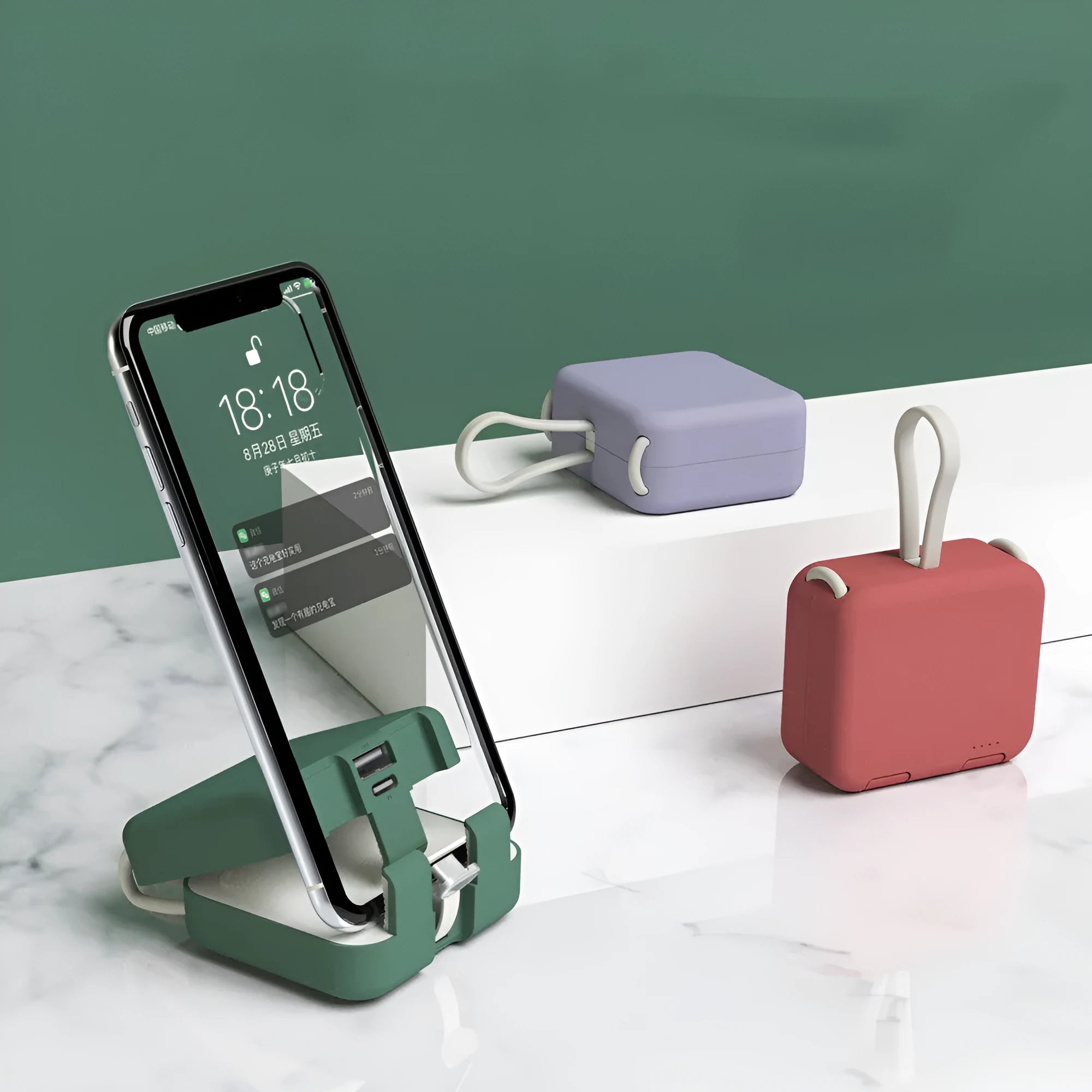 Handbag back clip power bank in blue, showing clip detail and phone standing in its holder mode.