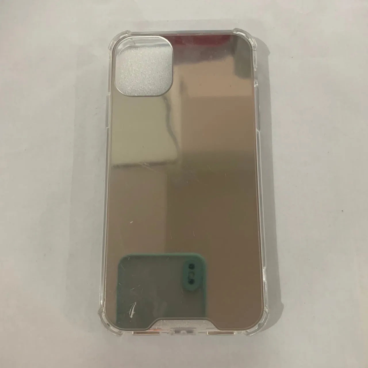 Reflective mirror phone case in soft TPU material available in multiple colours for various iPhone models showing back and side view