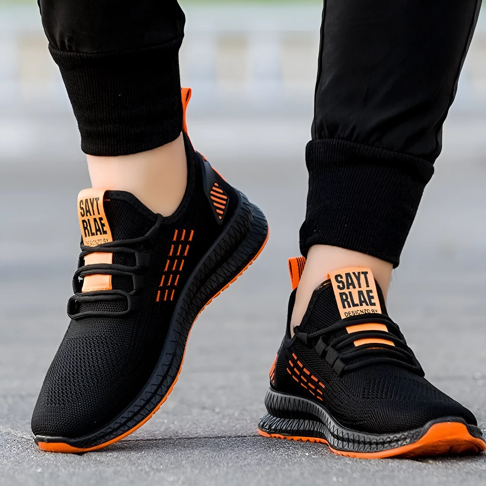 Men's low-top casual sports shoes with flying three bars stripes, cross straps, and a fly weave upper.