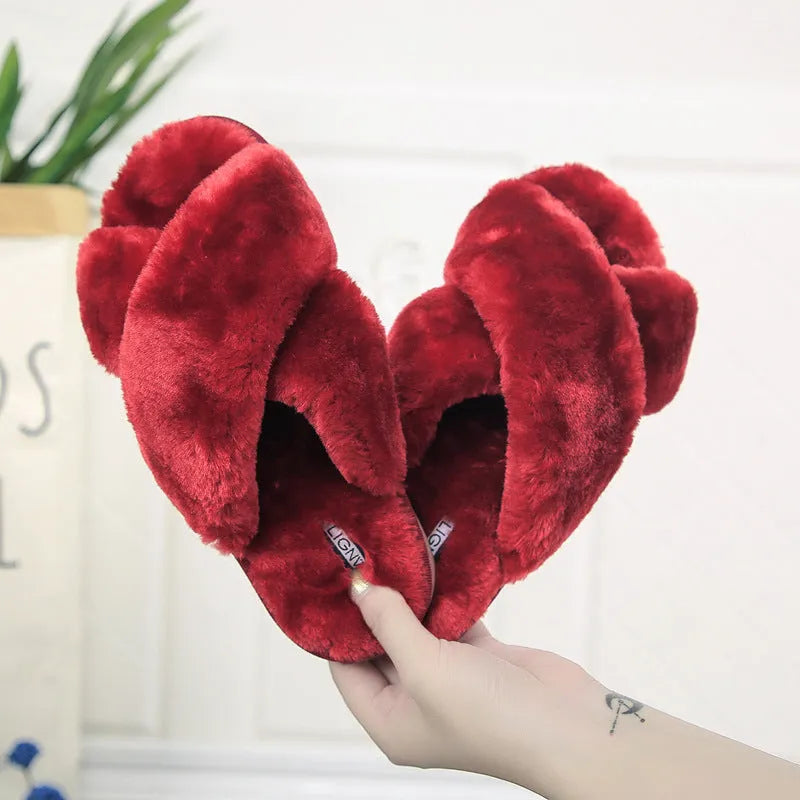 Cross open-toe fur slippers in multiple colours on a patterned non-slip sole.