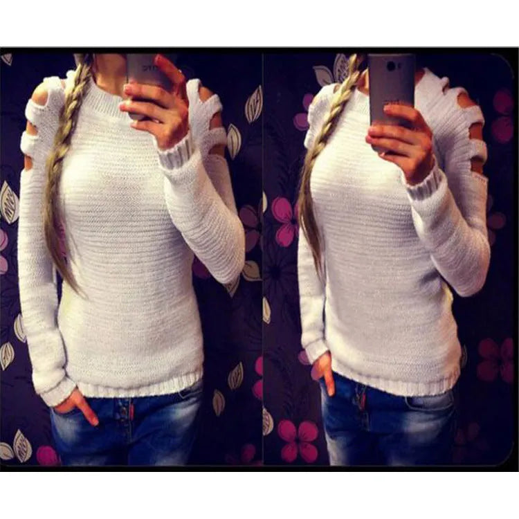 Women's grey crocheted hollow-out long-sleeved shirt with a round neck on a hanger