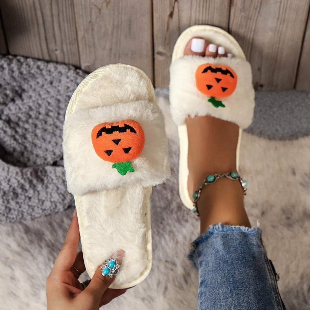 White and yellow Halloween cartoon pumpkin plush open-toe slippers with anti-slip PVC soles.