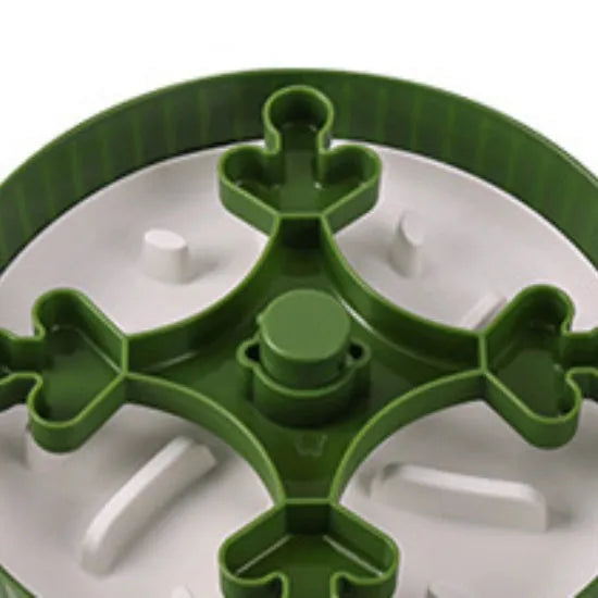Rotating pet food bowl with silicone slow feeder mat in blue with windmill pattern design