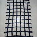 Black polyester ribbon children's climbing net with 1.5 inch wide straps and 5 inch mesh openings