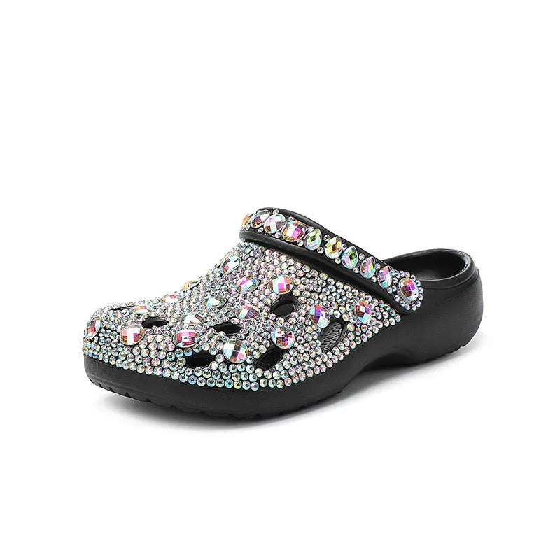 Black women's platform sandals with rhinestone details on an open hole design EVA upper.