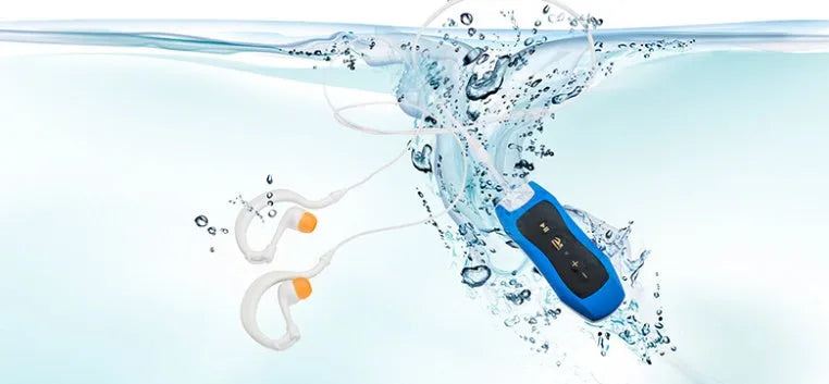 Compact black waterproof Bluetooth MP3 player for sports with no screen.