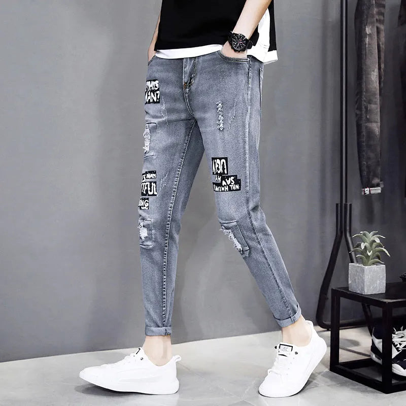 Men's autumn black ripped ankle jeans with micro elastic denim, youth-style tapered fit